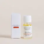 زيت معطر برائحة العسل والحلى والزهور البيضاء