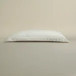 بيت مخدة قطن ٢ قطعة لون أوف وايت