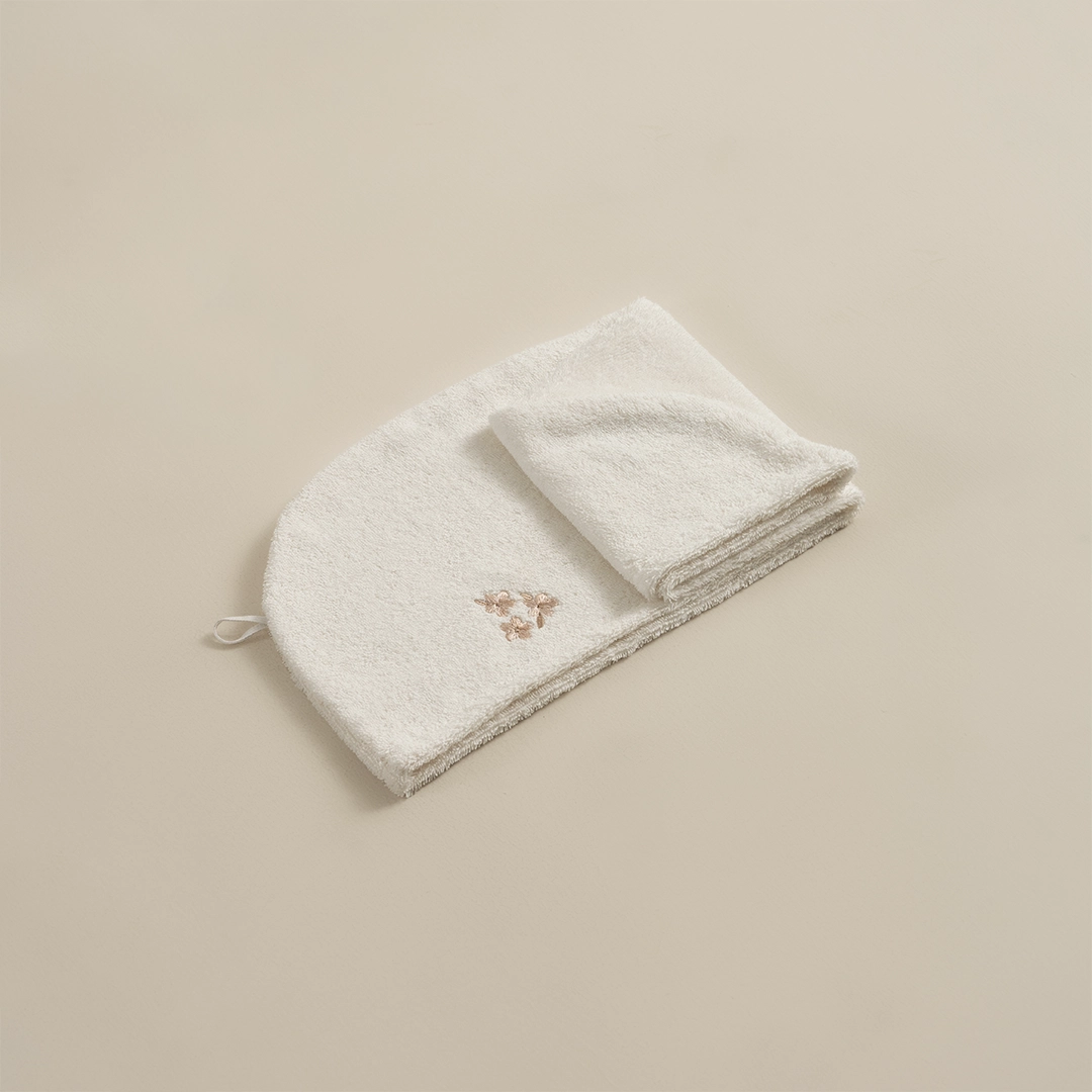 منشفة رأس قطن مطرز لون أوف وايت منشفة رأس قطن مطرز لون أوف وايت